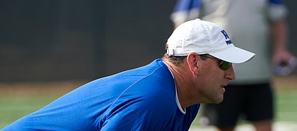 Kansas head coach David Beaty watches over players during a drill at practice on Saturday, August 4, 2018.