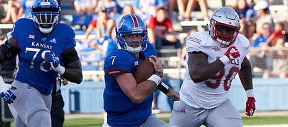 Kansas quarterback Peyton Bender (7) runs for the gain in the first quarter on Saturday, Sept. 1, 2018 at Memorial Stadium.