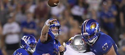 Kansas quarterback Peyton Bender (7) throws against Nicholls State during the second half of an NCAA college football game in Lawrence, Kan., Saturday, Sept. 1, 2018. (AP Photo/Reed Hoffmann