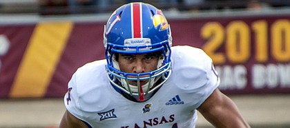Kansas receiver Kerr Johnson Jr. surveys the field in front of him after making a reception at Central Michigan.