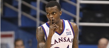 Kansas guard Lagerald Vick (24) shushes a Villanova player after hitting a three during the second half, Saturday, Dec. 15, 2018 at Allen Fieldhouse.
