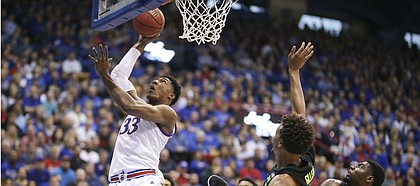 Kansas forward David McCormack (33) puts in a bucket during the first half, Saturday, March 9, 2019 at Allen Fieldhouse.