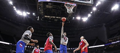 Kansas forward Dedric Lawson puts up a shot in the paint during an open practice on Wednesday, March 13, 2019 at Sprint Center.