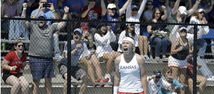 Kansas freshman Sonia Smagina and Kansas fans react to her win at No. 4 singles giving KU a 4-2 win against Florida on Saturday, May 4, 2019 at the Jayhawk Tennis Center. Kansas advances to the Sweet 16 next weekend.