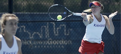 Kansas seniors Janet Koch, left, and Nina Khmelnitckaia, compete at No. 1 doubles on May 4, 2019, against Florida. Kansas won to advance to the NCAA Tournament's round of 16.