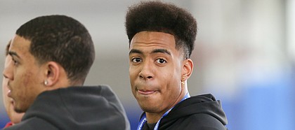 Kansas signee Jayden Russell scans the practice facility during football practice on Wednesday, March 6, 2019 within the new indoor practice facility.