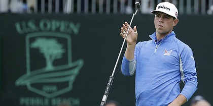 Gary Woodland reacts after missing a putt on the 18th hole during the third round of the U.S. Open golf tournament Saturday, June 15, 2019, in Pebble Beach, Calif. At -11 for the tournament, the former University of Kansas standout is the 54-hole leader at this year's Open.