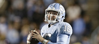 FILE — Quarterback Manny Miles (16) looks to pass against Western Carolina during the second half of for North Carolina, in Chapel Hill, N.C., Saturday, Nov. 17, 2018. The son of Kansas football coach Les Miles, Manny is joining the Jayhawks as a graduate transfer. (AP Photo/Gerry Broome)