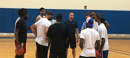Former KU guard Brady Morningstar, shown here at center at the end of a team practice on Monday, July 22, 2019, has been given head coaching duties for the Self Made squad at this summer's The Tournament event. Self Made opens plays at 6 p.m. Thursday, July 25 at Koch Arena in Wichita.