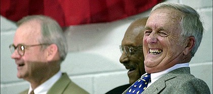 Max Falkenstien, a native of Lawrence, Kan., laughs as he is introduced during the Kansas Sports Hall of Fame induction Saturday, June 9, 2001, in Abilene, Kan. Falkenstien was a broadcaster for the Kansas basketball and football programs for more than 50 years. Also inducted were Jeff Farrel, left, and Linwood Sexton, center.