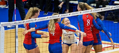 Senior libero Allie Nelson (1) celebrates with her team. KU defeated Morehead State 3-0 Thursday, Sept. 12.