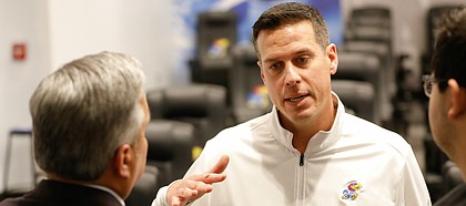 Kansas defensive coordinator D.J. Eliot talks with media members following head coach Les Miles' signing day press conference on Wednesday, Dec. 18, 2019 in Mrkonic Auditorium.