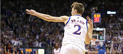 Kansas guard Christian Braun (2) celebrates after hitting a three against Kansas State during the first half, Tuesday, Jan. 21, 2020 at Allen Fieldhouse.