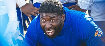 Kansas football coach Les Miles promoted former quality control staffer Chidera Uzo-Diribe, naming him KU's new outside linebackers coach on Jan. 24, 2020.