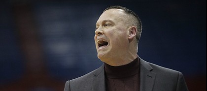 Kansas coach Brandon Schneider yells to his team during the first half of an NCAA college basketball game against Baylor in Lawrence, Kan., on Wednesday, Jan. 15, 2020.