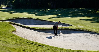Gary Woodland hits out of the sand on the 11th hole during the first round of the Charles Schwab Challenge golf tournament at the Colonial Country Club in Fort Worth, Texas, Thursday, June 11, 2020.