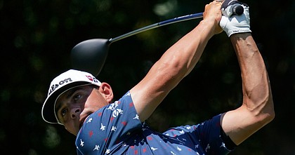 Gary Woodland tees off on the 12th hole during the third round of the Charles Schwab Challenge golf tournament at the Colonial Country Club in Fort Worth, Texas, Saturday, June 13, 2020.