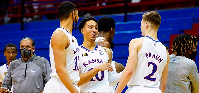 Kansas forward Jalen Wilson (10) and Kansas guard Christian Braun (2) share a moment following the Jayhawks' 73-72 win over Creighton on Tuesday, Dec. 8, 2020 at Allen Fieldhouse. The Jayhawks escaped with the win despite Braun missing the front end of a one-and-one and Wilson fouling Creighton guard Marcus Zegarowski (11) on a three-point shot with seconds remaining.