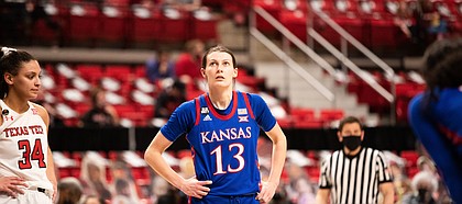 Kansas guard Holly Kersgieter looks up toward the scoreboard during a road game at Texas Tech, on Feb. 20, 2021.