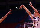 Kansas guard Holly Kersgieter shoots over the extended arm of Texas defender Joanne Allen-Taylor on Feb. 24, 2021, at Allen Fieldhouse.