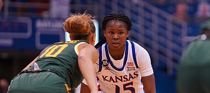 Kansas guard Zakiyah Franklin surveys the floor from the top of the key against Baylor on March 6, 2021, inside Allen Fieldhouse.