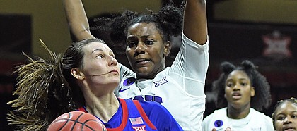 Kansas guard Holly Kersgieter tries to find some space inside versus TCU during the Phillips 66 Big 12 Women's Basketball Championship at Municipal Auditorium in Kansas City, Missouri on March 11, 2021.