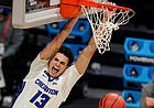 Creighton forward Christian Bishop (13) follows through on a dunk against Ohio in the second half of a second-round game in the NCAA men's college basketball tournament at Hinkle Fieldhouse in Indianapolis, Monday, March 22, 2021. 


