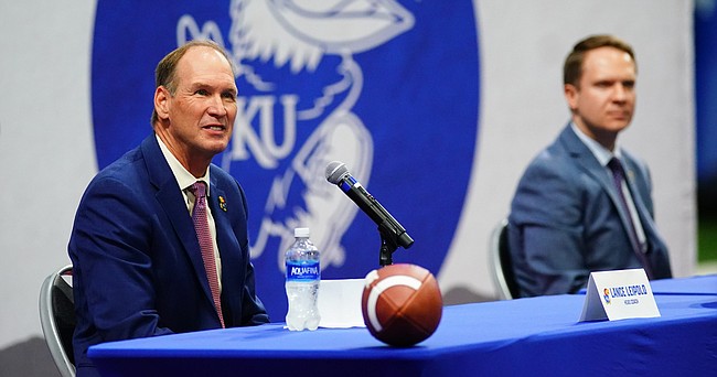 New Kansas head football coach Lance Leipold and athletic director Travis Goff sit for questions during an introductory press conference on Monday, May 3, 2021 at the KU football indoor practice facility.
