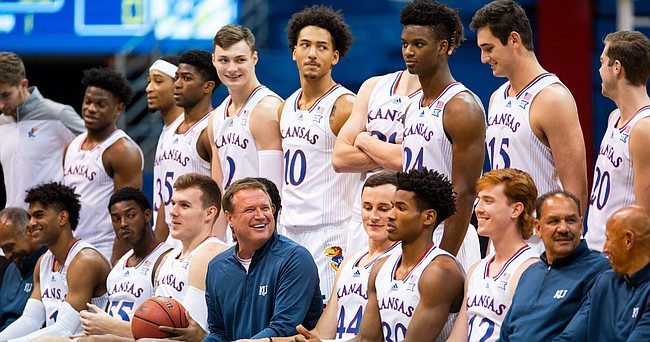 Kansas Jayhawks head coach Bill Self has a laugh with his players as they get situated for their official team photo during Media Day on Tuesday, Nov. 2, 2021 at Allen Fieldhouse.