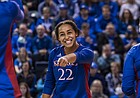 Kansas setter Camryn Turner points to teammate Caroline Bien (No. 14) during a second-round NCAA Tournament match  versus Creighton at D.J. Sokol Arena in Omaha, Neb., on Dec. 3, 2021.