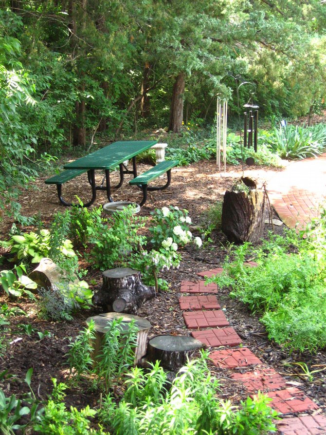 Photo Audio Reader Lawrence Ks Our Extra Long Wheelchair Accessible Picnic Table Is Placed In A Shady Spot Of The Sensory Garden Near Two Lovely Hand Tuned Windchimes