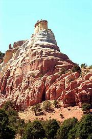 A seemingly sculpted rock formation breaks from the landscape near
the natural Echo Amphitheater along U.S. Highway 84. The scenic
drive from Santa Fe to Taos can take from three to five hours,
depending on how many times you stop and take pictures.
