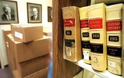 Kansas University officials are concerned suspected militia members
may try to take old books from the law library in Green Hall.