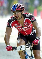 Lawrence's Hiram Salvini rides to victory in the mountain biking competition at the 2000 Sunflower State Games.