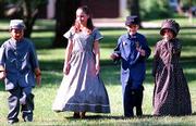 Youngsters dressed in Civil War period clothing enjoy the "Civil
War on the Western Front" activities.
