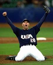 U.S. pitcher Ben Sheets reacts after defeating Cuba, 4-0. The U.S.
baseball team won the gold medal Wednesday at Sydney, Australia.
