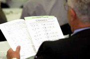 Participants follow along with instructors during a course to
improve legibility and avoid potentially dangerous mistakes by
those who must decipher doctors' poor penmanship.