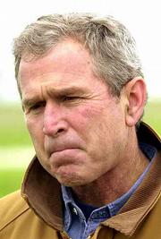 Republican presidential candidate Texas Gov. George W. Bush talks
with journalists on his ranch near Crawford, Texas, Saturday, Nov.
11, 2000.