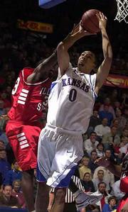 Drew Gooden drives on Illinois State's Shedrick Ford, left. Gooden
scored a game-high 17 points Thursday at Allen Fieldhouse.