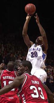 KU's Kenny Gregory (20) rises above the Illinois State defense.
Gregory finished with 11 points on Thursday at Allen Fieldhouse.