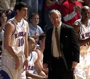 KU coach roy williams was seething when he pulled his starters,
including Kirk Hinrich (10), Drew Gooden, second from left, and
Kenny Gregory, far right, early against Illinois State. The
Jayhawks struggled to an 80-61 victory Thursday night at Allen
Fieldhouse.