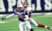 Indianapolis' Jerome Pathon, front, is brought down from behind by
Buffalo cornerback Darrell Porter. The play setup the Colts' first
field goal in a 44-20 victory over the Bills on Monday in
Indianapolis.