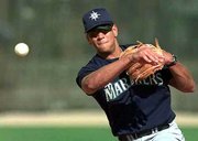 Former Seattle Shortstop Alex Rodriguez signed a $252 million,
10-year pact with the Texas Rangers on Monday.