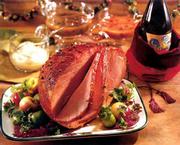 Glazed Baked Ham is one of the rich-looking holiday foods that can
also be low-fat, when prepared with a recipe in "Betty Crocker&squot;s
Best Christmas Cookbook."