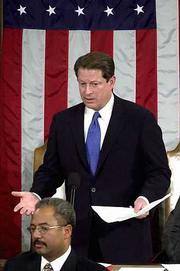 Vice President Al Gore responds to members of the Black
Congressional Caucus as they object to results of Florida's
electoral vote count, during a joint session of Congress Saturday
in Washington.