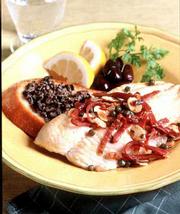 Catfish Pan-Seared With Brown Butter, Prosciutto, Lemon, Almonds
and Capers on Black Olive Toast is quick to make. It has a
sophisticated blend of flavors and presentation, but you can get it
on the table in about half an hour.