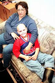 A community chili supper has been organized in Baldwin to raise
funds for Rita Guy and her son, Jody, 8. Jody, a second-grader, was
diagnosed with leukemia in November and has been undergoing
chemotherapy. The benefit also will feature a silent auction,
karaoke and children's activities.