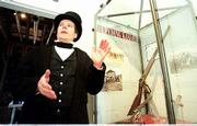 Tim Rues, curator of constitution hall, stands before a "Bleeding
Kansas" exhibit and recounts issues leading up to the state&squot;s
birth. Rues, who worries about the loss of Civil War sites, spoke
Sunday at Constitution Hall in Lecompton.