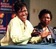 Lynette Woodard, left, announces her retirement from the WNBA in
this May 27, 1999, file photo. Woodard and Kansas coach Marian
Washington, right, want the NCAA to include AIAW records in the
college record books.
