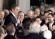 President Bush is applauded by guests in the East Room during a
visit this weekend by Irish Prime Minister Bertie Ahern to the
White House. The Bush administration may end the American Bar
Assn.'s half-century role in evaluating nominees to the federal
bench, government sources said Saturday.
